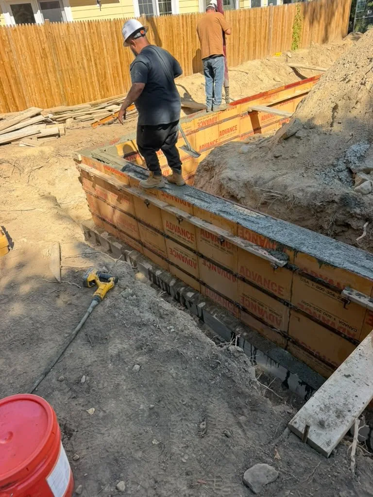 Crew members on foundation wall forms