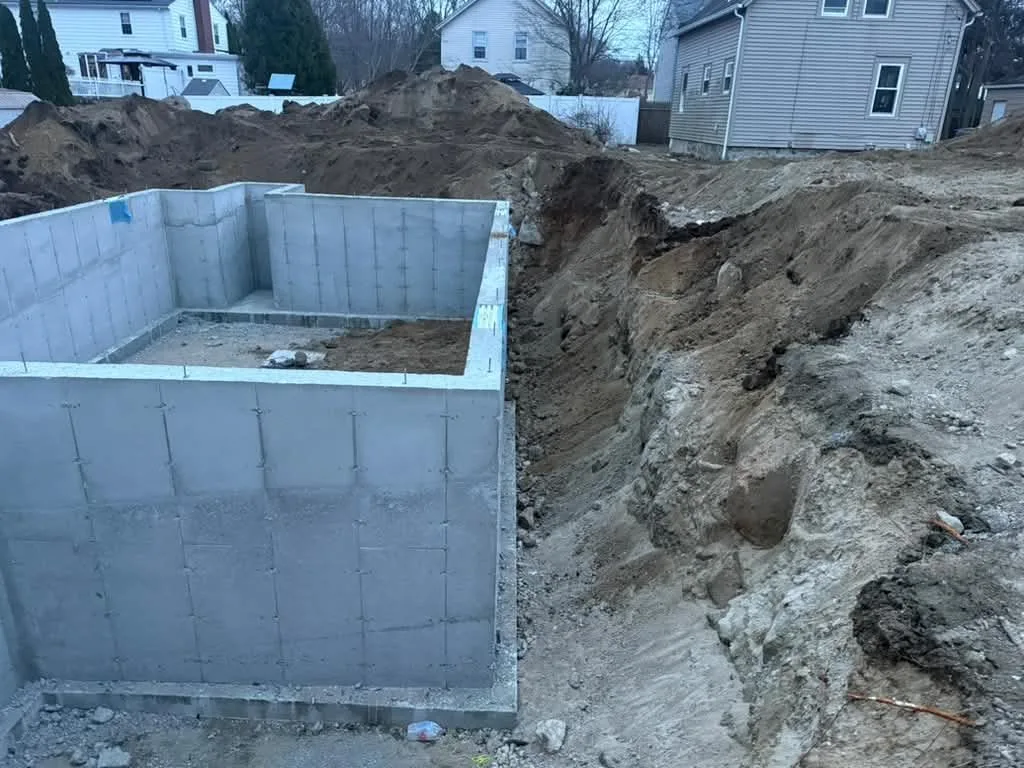 New poured concrete foundation walls on a Rhode Island lot